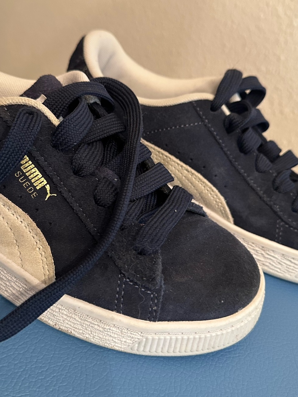Puma Suede Low-Top Sneakers in Navy and Cream